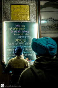 Sikh writing excerpt from prayer on chalkboard